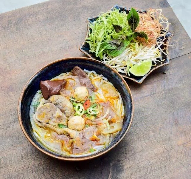 Gọi tên 12 quán ăn quận 2 ngon mà tín đồ ẩm thực nào cũng mê mẩn ẩm thực baba kitchen bánh xèo bánh xèo ba híu gốc huế hột vịt lộn kim thảo lão trư BBQ lẩu bò Lẩu Bò Nghĩa Địa metta vegeterian phở bùi gia quận 2 quán ăn quán ăn quận 2 quán dê đồng cỏ Sushi Nhí thông tin vị bò năm châu