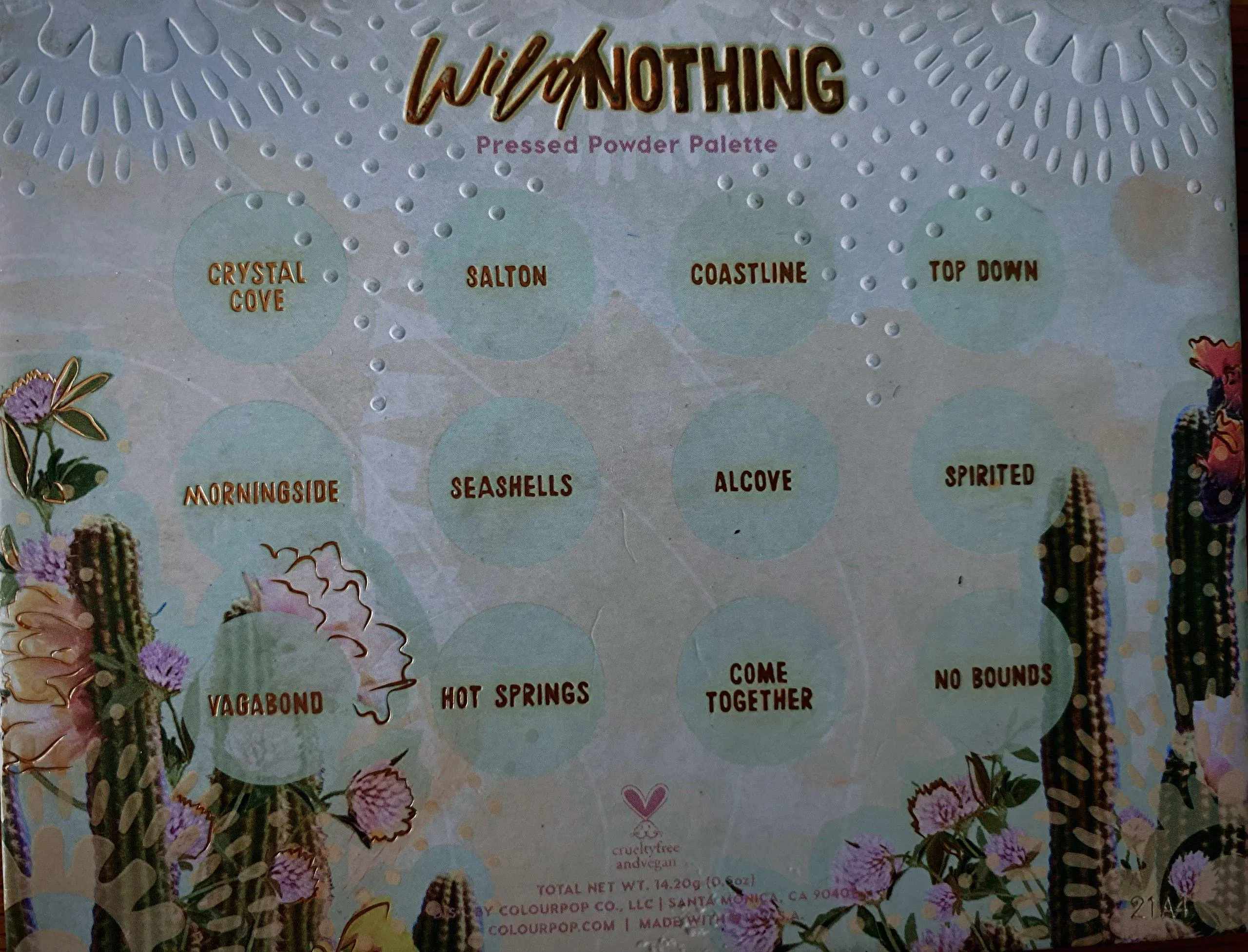 Mặt sau bảng phấn mắt Colourpop Wild Nothing Eyeshadow Palette có in tên của 12 ô phấn nén (nguồn: Minh Như)