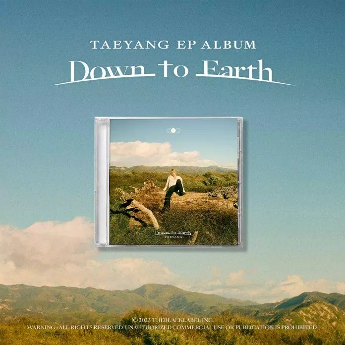 Bìa mini album "Down to Earth" (Ảnh: Internet)