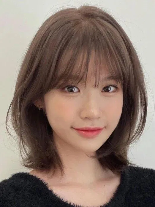 Gợi ý kiểu tóc ngắn layer nữ phù hợp với khuôn mặt dài. (Ảnh: Internet)