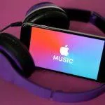 PARIS, FRANCE - APRIL 08: In this photo illustration, the logo of the music streaming platform Apple Music is displayed on the screen of an iPhone on April 08, 2019 in Paris, France. The number of paying subscribers to the music streaming service of Apple Music has for the first time exceeded that of Spotify customers in the US. The two platforms now have 28 and 26 million paying users, respectively, sources told the Wall Street Journal. (Photo by Chesnot/Getty Images)
