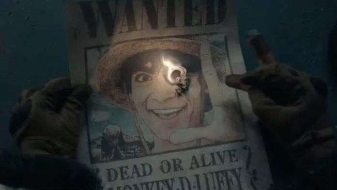 Tấm áp phích truy nã của Luffy bị đốt bởi một nhân vật bí ẩn (Ảnh: Internet)