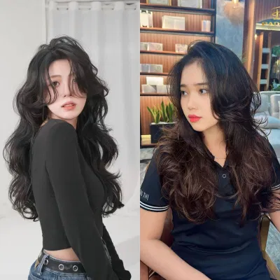 Tóc xoăn nữ được tạo kiểu bởi salon (Nguồn: Internet) Tóc xoăn nữ được tạo kiểu bởi salon (Nguồn: Internet)