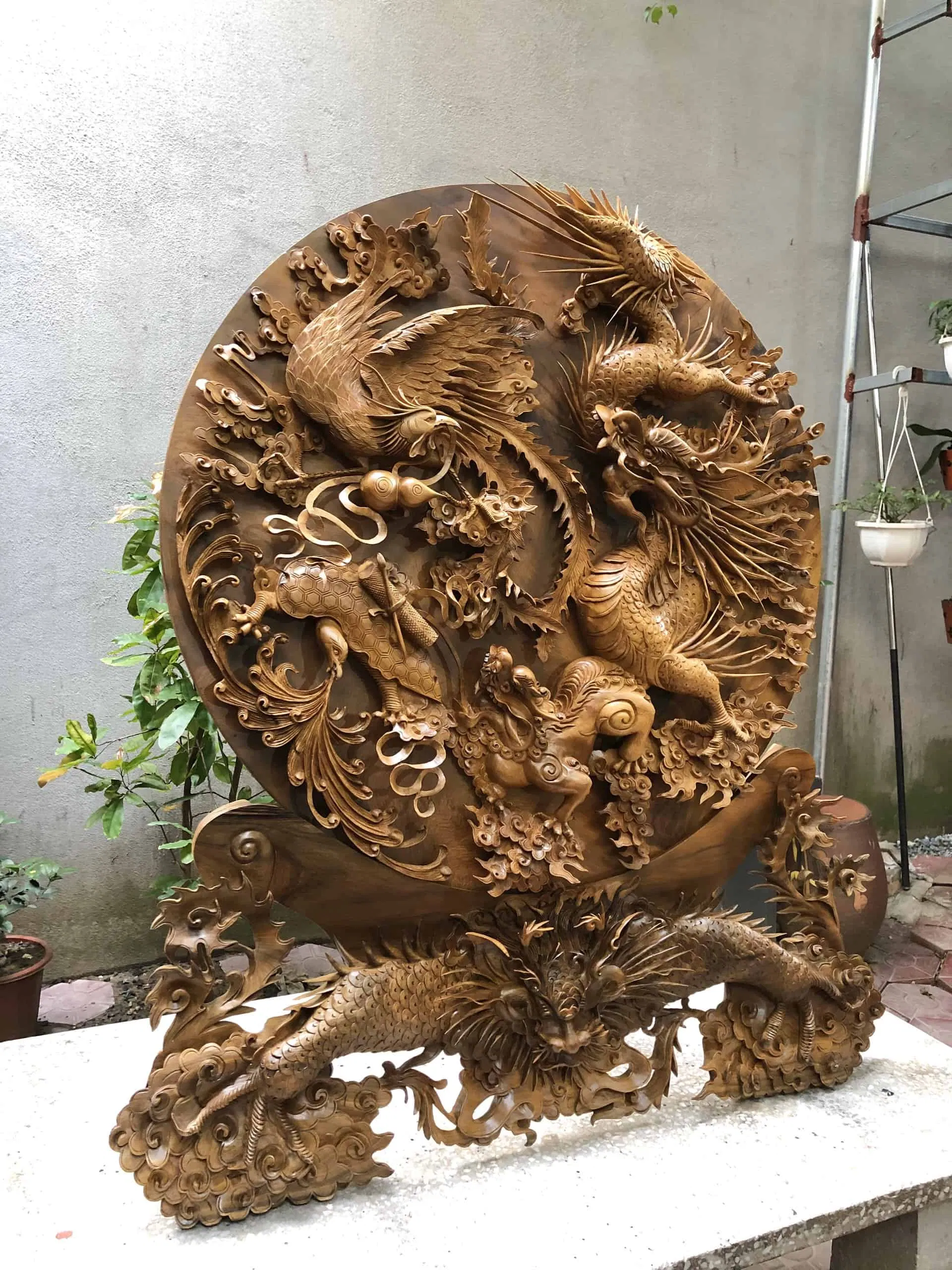 Mẫu đĩa bằng đá Tứ long trấn đẹp mắt (Ảnh: Internet) Mẫu đĩa bằng đá Tứ long trấn đẹp mắt (Ảnh: Internet)