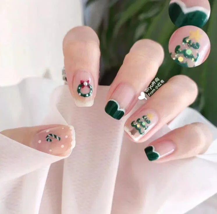 Mẫu nail Noel màu xanh ấn tượng (Ảnh: Internet)