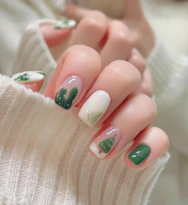 Mẫu nail Noel màu xanh ấn tượng (Ảnh: Internet)