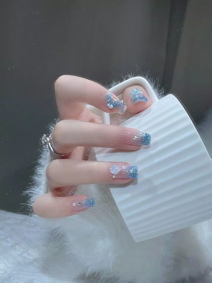 Mẫu nail Giáng Sinh mắt mèo hot trend (Ảnh: Internet)