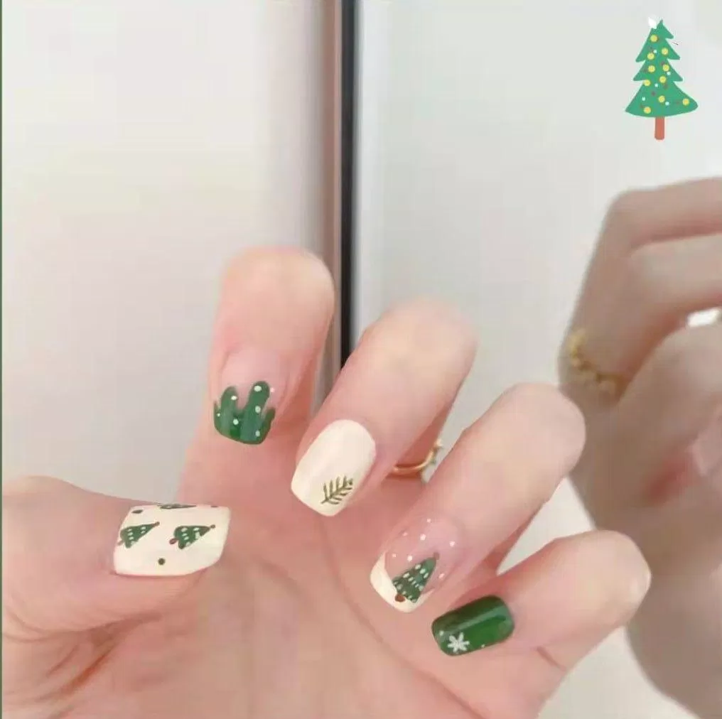 Mẫu nail Noel màu xanh ấn tượng (Ảnh: Internet)