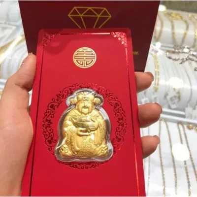 Mua vật phẩm phong thủy ngày Vía Thần Tài để may mắn (Ảnh: Internet)