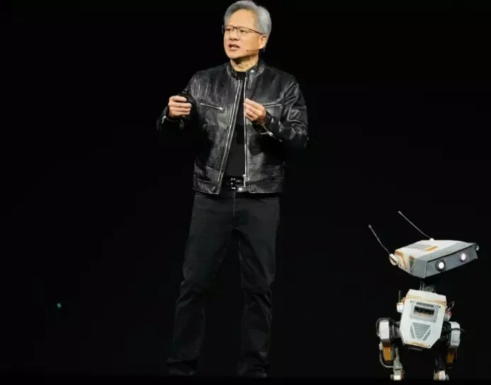 Jensen Huang - người sáng lập Nvidia phát biểu tại hội nghị công nghệ gần đây ở San Jose cùng với robot (Ảnh: Internet)