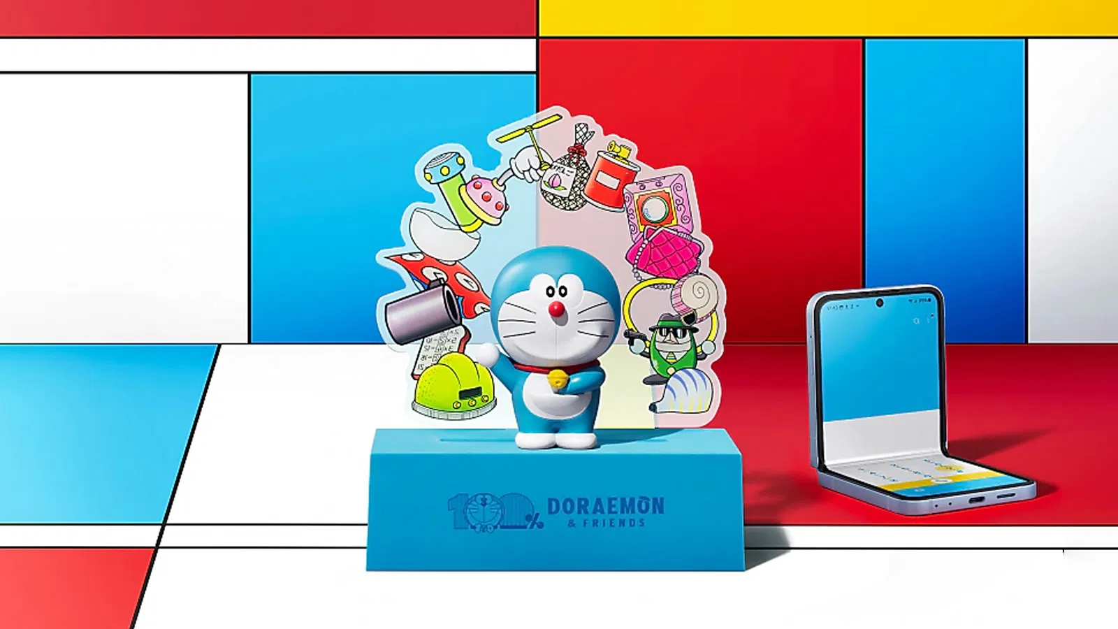 Bộ sản phẩm còn bao gồm đế dựng điện thoại in hình Doraemon với thiết kế nam châm tiện lợi, giúp bạn dễ dàng đặt điện thoại ở mọi góc độ (Ảnh: Internet) Bộ sản phẩm còn bao gồm đế dựng điện thoại in hình Doraemon với thiết kế nam châm tiện lợi, giúp bạn dễ dàng đặt điện thoại ở mọi góc độ (Ảnh: Internet)