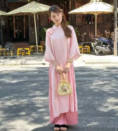 Áo dài lông vũ Yến Phượng dáng xuông